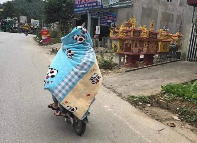 Cach chong ret dac biet cua nguoi dan mien bac khi tham gia giao thong - 6