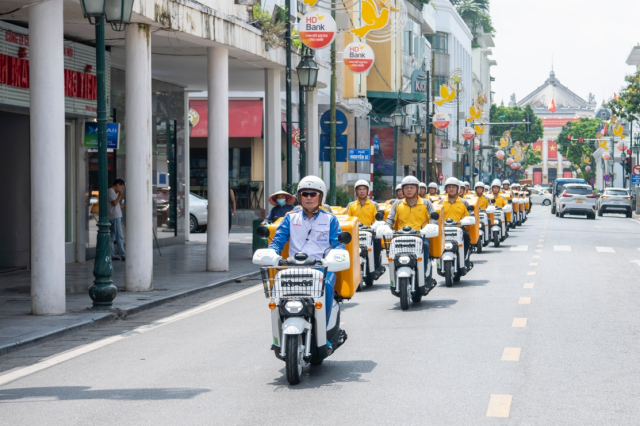 Honda Viet Nam va Buu dien Viet Nam day manh hop tac mo rong du an su dung xe dien giao hang - 8
